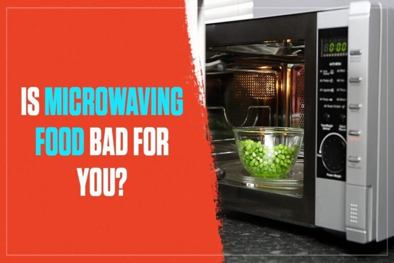 Green veggies in a glass dish inside a microwave oven