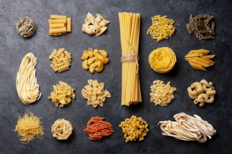 Different pasta variants on a black background