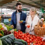 A Couple shopping at the local farmers market