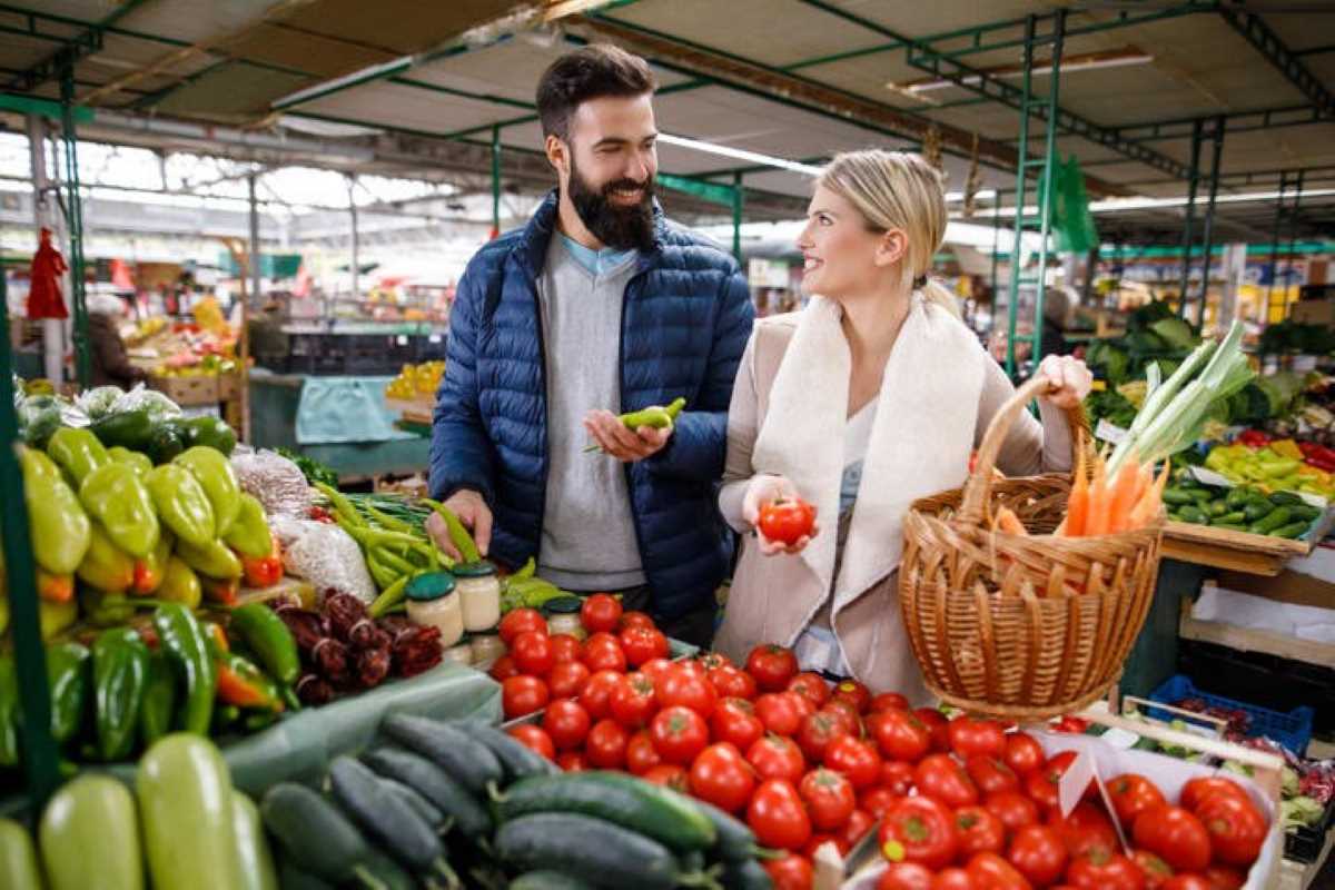 A Couple shopping at the local farmers market