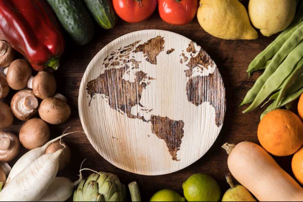 Top view vegetables arrangement with plate