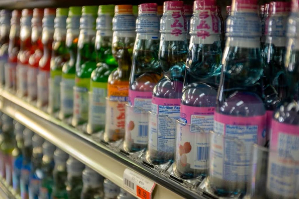 Pink and blue labeled bottles