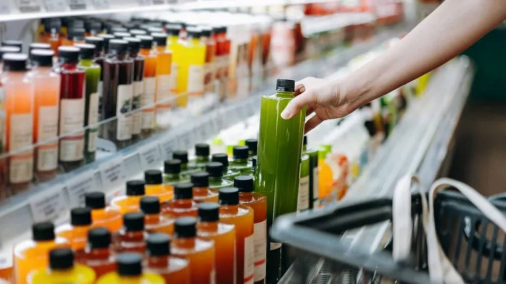 Wellness drinks with blurred brand information on a store shelf