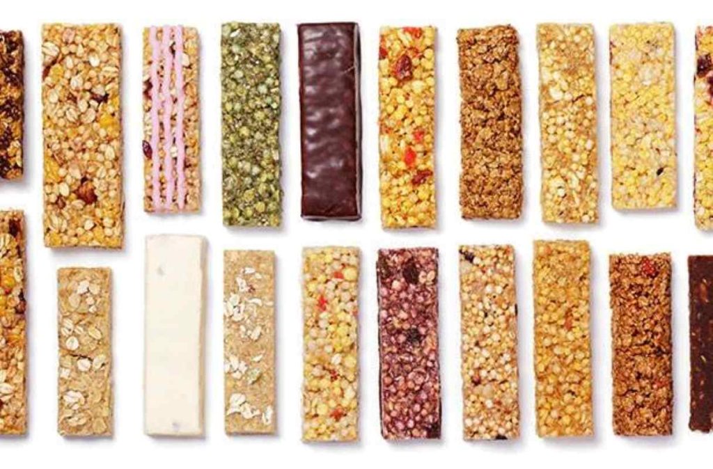 A lineup of gourmet energy bars with different textures
