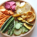 Multiple crunchy food products arranged nicely in a platter