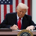 President Trump signing a bill