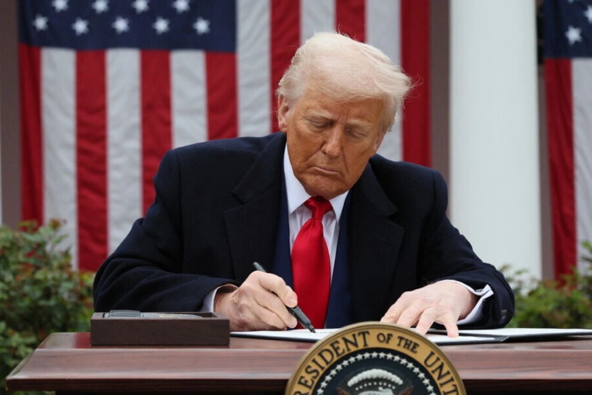 President Trump signing a bill