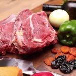 Preparing a meal of baked meat and vegetables