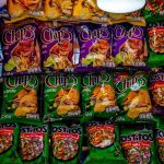 Packaged fermented snacks displayed on a store shelf