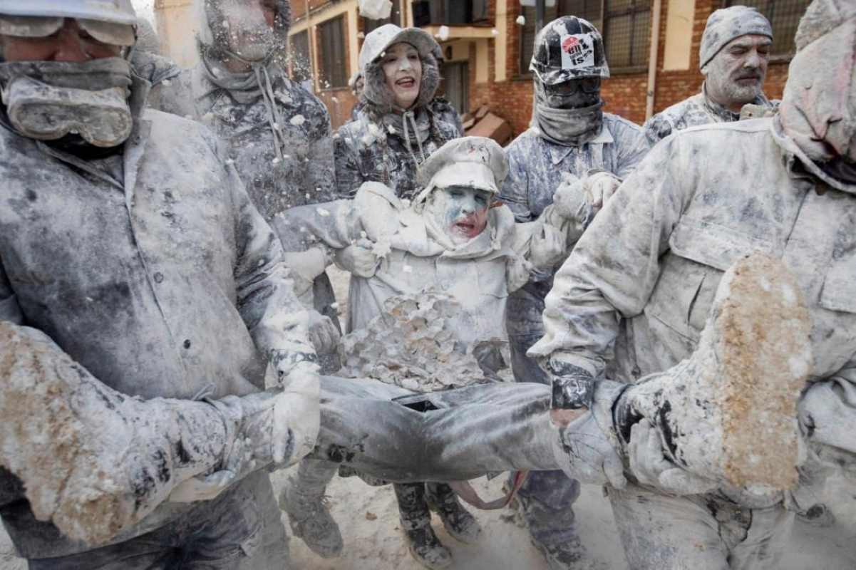 December 28, locals celebrate the unusual winter festival of Els Enfarinats