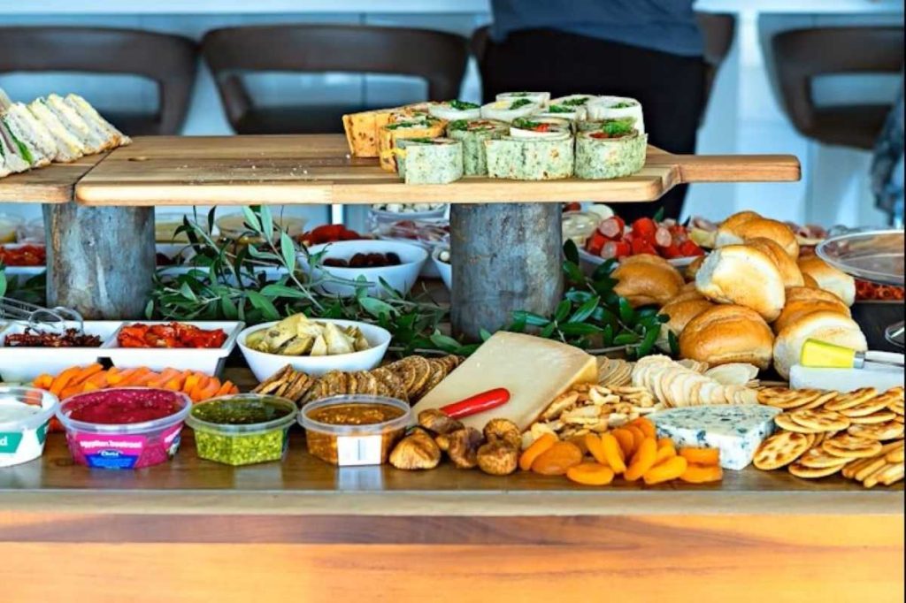 A picture displaying different types of food in open and closed containers